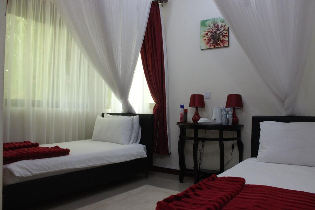 Signature Hotel Apartments Jinja Zimmer foto